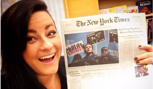 NY Times front page held up by Destiny Herndon De La Rosa